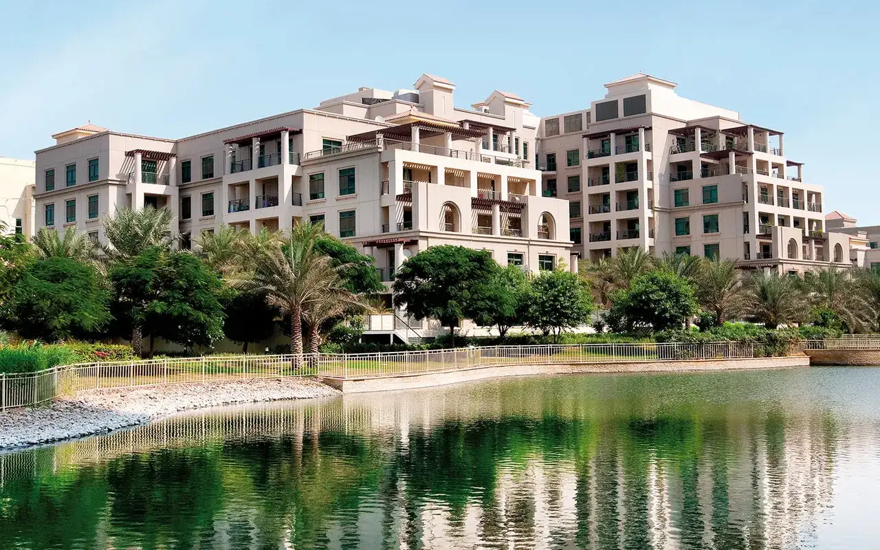 The Greens, completed apartment buildings beside the landscaped lake. Area context, not a photograph of Links Canal.