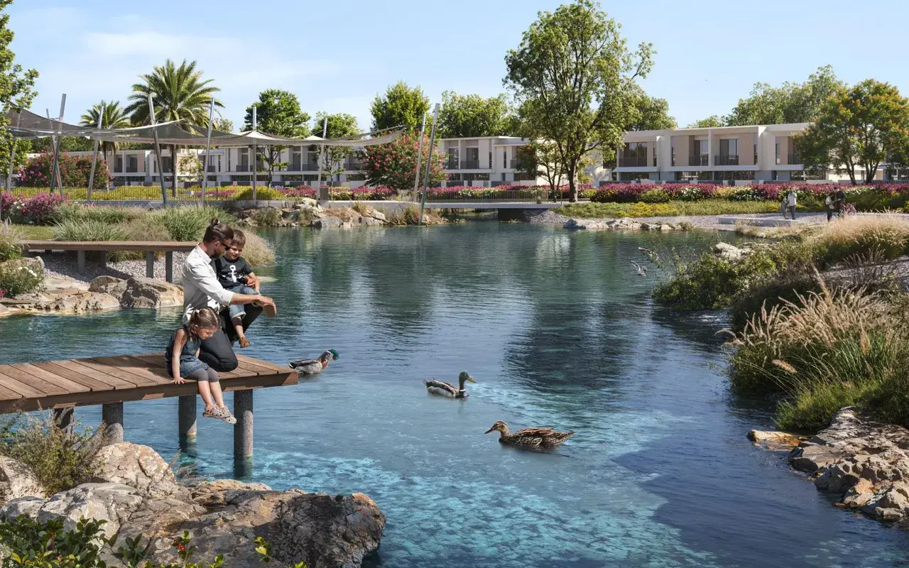 The Valley, landscaped waterside park and completed homes. Area context, not a photograph of The Valley – Rivana.