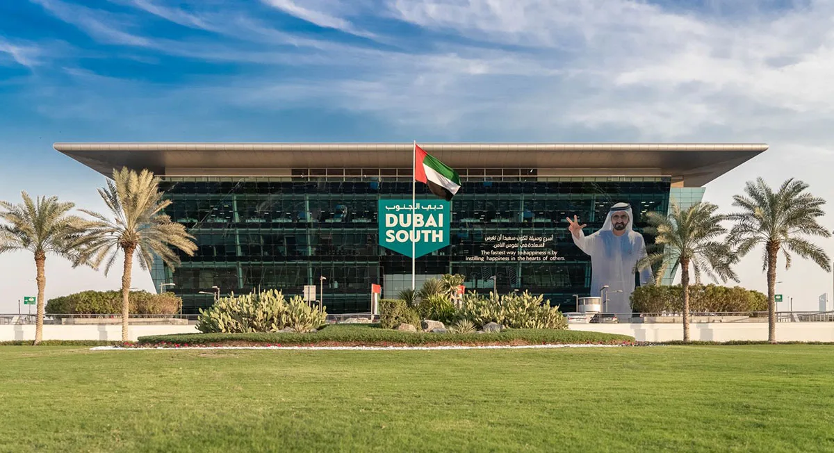 Dubai South headquarters building and landscaped forecourt. Area context, not a photograph of Avion Residence.