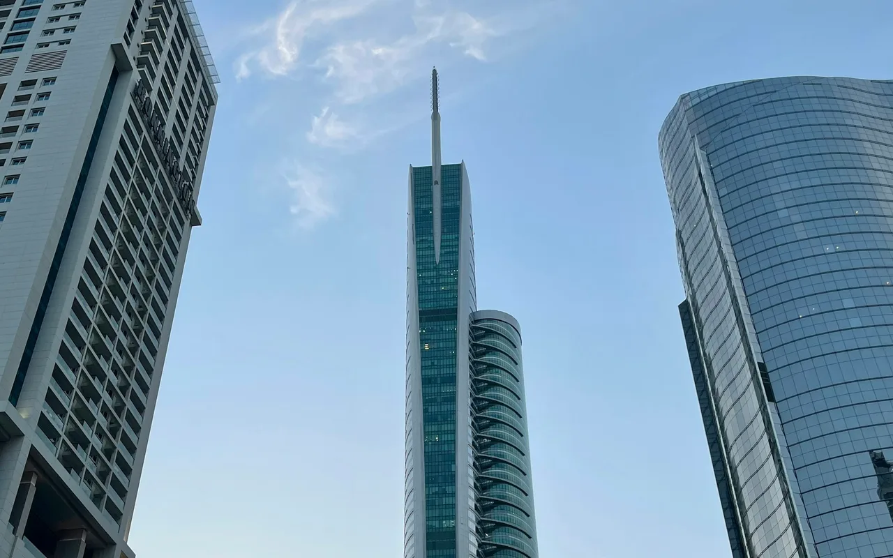 Almas Tower and completed neighbouring towers in Jumeirah Lake Towers, Dubai.. Area context, not a photograph of Green Lakes S2.